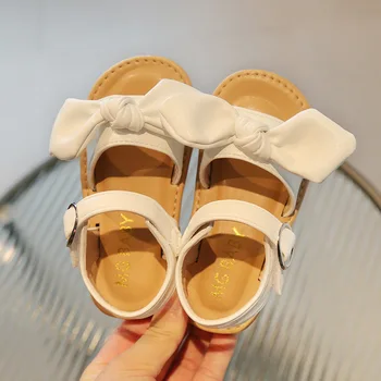 Летняя детская обувь 2023 года, сандалии принцессы для маленьких девочек из искусственной кожи, детские сандалии с бантиком-бабочкой, детская пляжная обувь, студенческие туфли на плоской подошве, Мягкие сандалии